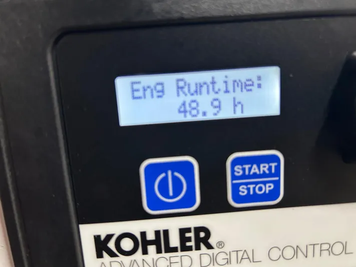 Reel Estate Yacht Photos Pics Kohler digital control panel showing engine runtime of 48.9 hours on Tiara Yachts 3500 Express.