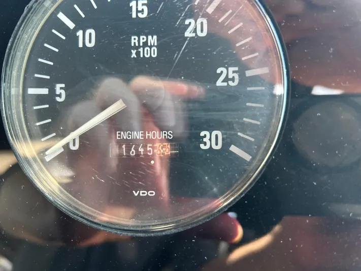 Reel Estate Yacht Photos Pics Close-up of Tiara Yachts 3500 Express 1998 tachometer showing 1645 engine hours.