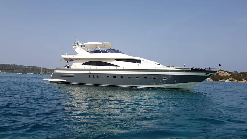  Yacht Photos Pics Luxury yacht PerMare Amer 86, 2007 model, cruising on clear blue waters.