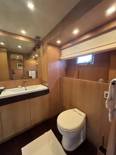  Yacht Photos Pics Luxurious bathroom interior of 2007 PerMare Amer 86 yacht with modern fixtures.