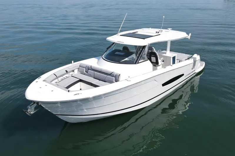 It's Good Yacht Photos Pics 2024 Regal 38 Surf boat on calm water, showcasing sleek design and modern features.