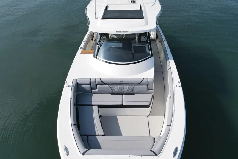 It's Good Yacht Photos Pics 2024 Regal 38 Surf boat with spacious seating on calm water.