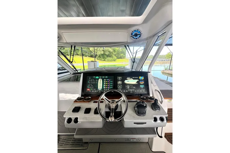 It's Good Yacht Photos Pics 2024 Regal 38 Surf boat dashboard with modern controls and touchscreen display.