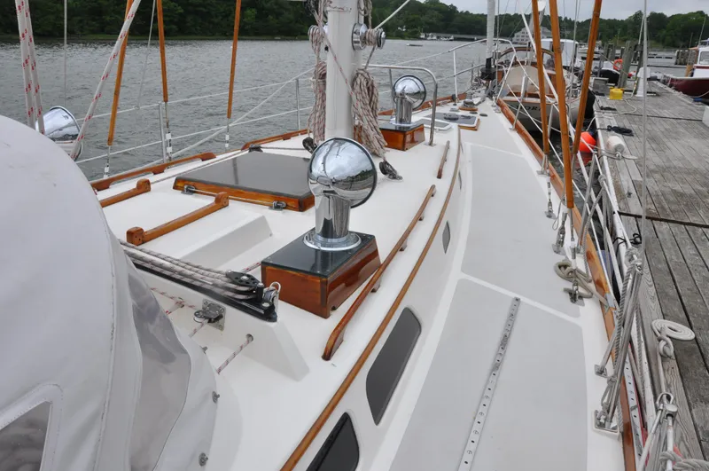 Helianthus Yacht Photos Pics 1985 Hinckley SW 42 sailboat deck with chrome winches and wooden accents.
