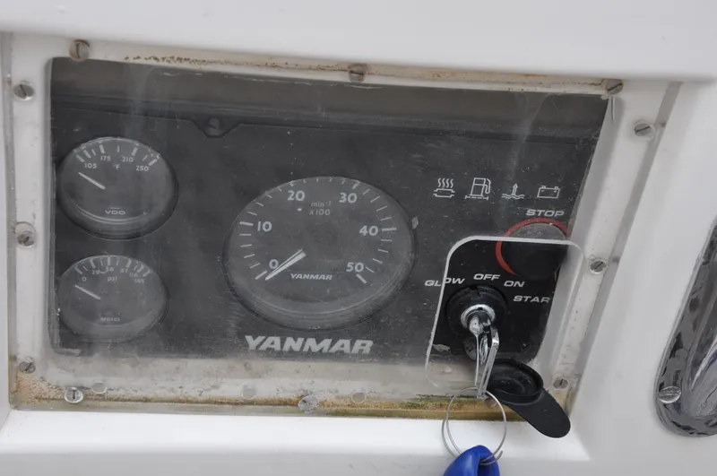 Helianthus Yacht Photos Pics Hinckley SW 42 1985 Yanmar engine control panel with gauges and ignition key.