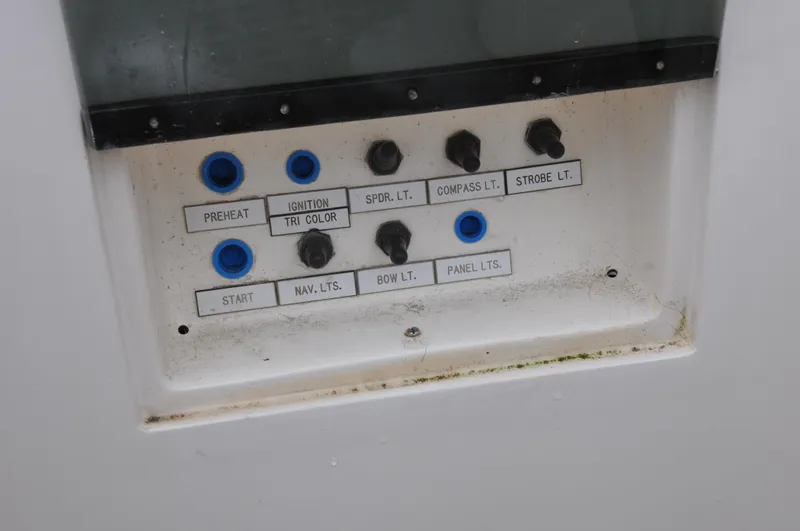 Helianthus Yacht Photos Pics Control panel of a 1985 Hinckley SW 42 sailboat with labeled switches.