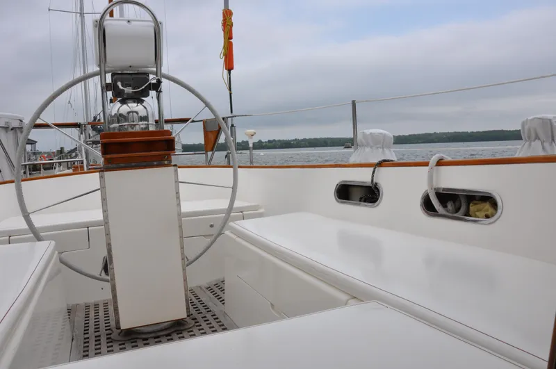 Helianthus Yacht Photos Pics Cockpit of 1985 Hinckley SW 42 sailboat with steering wheel and seating.