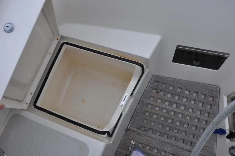 Helianthus Yacht Photos Pics Open storage compartment on 1985 Hinckley SW 42 sailboat deck.