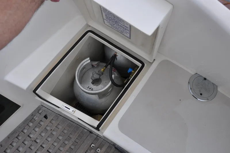 Helianthus Yacht Photos Pics Propane tank storage compartment on a 1985 Hinckley SW 42 sailboat.