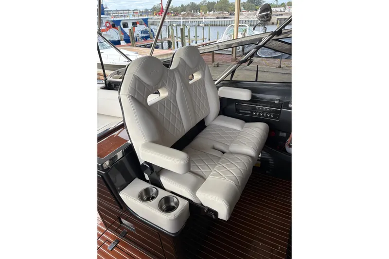 La Ruta Yacht Photos Pics Luxurious seating on 2017 Riva 38' Rivamare yacht with quilted leather and cup holders.