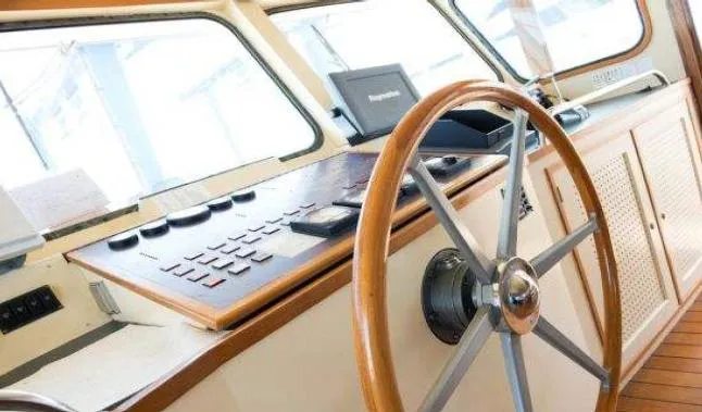 Zeewoelf Yacht Photos Pics Vintage 1963 Custom mr. de Boot yacht helm with wooden steering wheel and control panel.