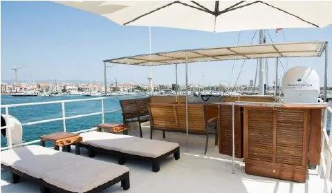 Zeewoelf Yacht Photos Pics Deck of 1963 Custom Mr. de Boot yacht with sun loungers and seating area.