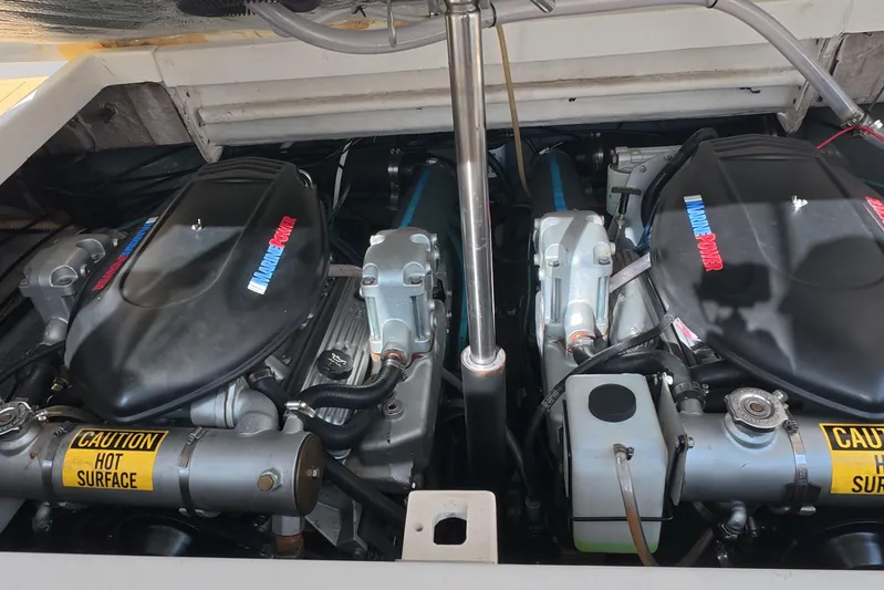 Island Girl Yacht Photos Pics Engine compartment of a 1992 Luhrs 300 Tournament boat, featuring twin marine engines.