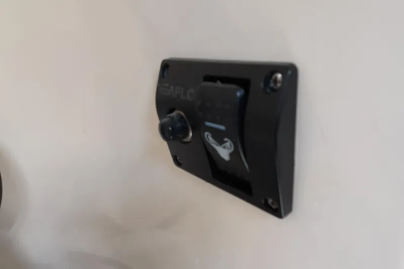 Island Girl Yacht Photos Pics Switch panel on 1992 Luhrs 300 Tournament boat interior wall.