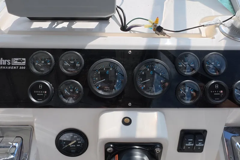 Island Girl Yacht Photos Pics 1992 Luhrs 300 Tournament dashboard with gauges and controls.