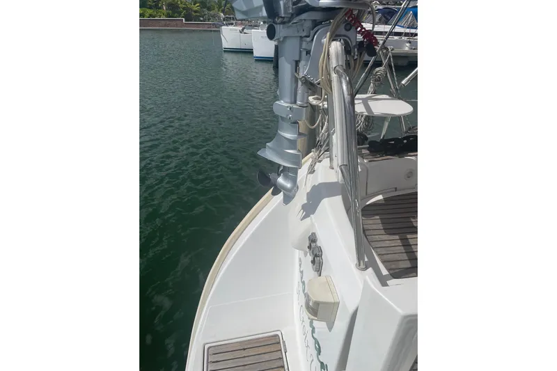 Kasoumai Yacht Photos Pics 2007 Beneteau 423 sailboat stern with motor, docked in marina.