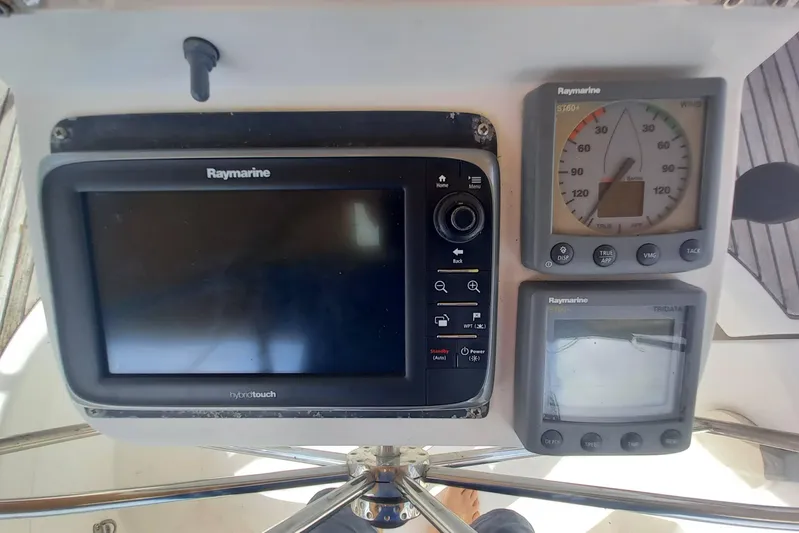 Kasoumai Yacht Photos Pics Raymarine navigation instruments on a 2007 Beneteau 423 yacht dashboard.