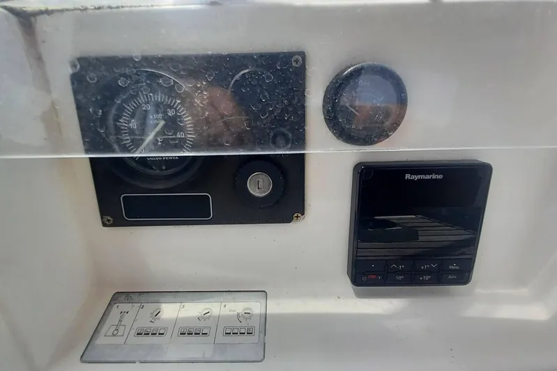 Kasoumai Yacht Photos Pics Control panel of a 2007 Beneteau 423 sailboat with Raymarine display and gauges.