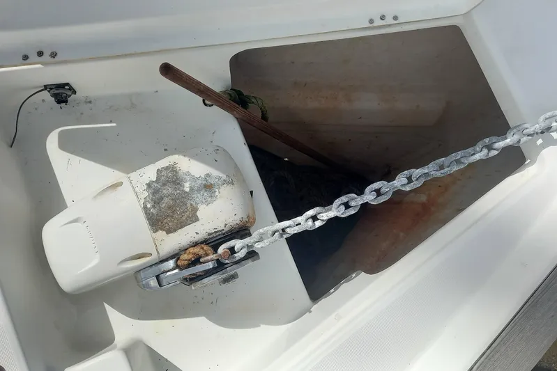 Kasoumai Yacht Photos Pics Anchor chain and windlass on a 2007 Beneteau 423 sailboat deck.