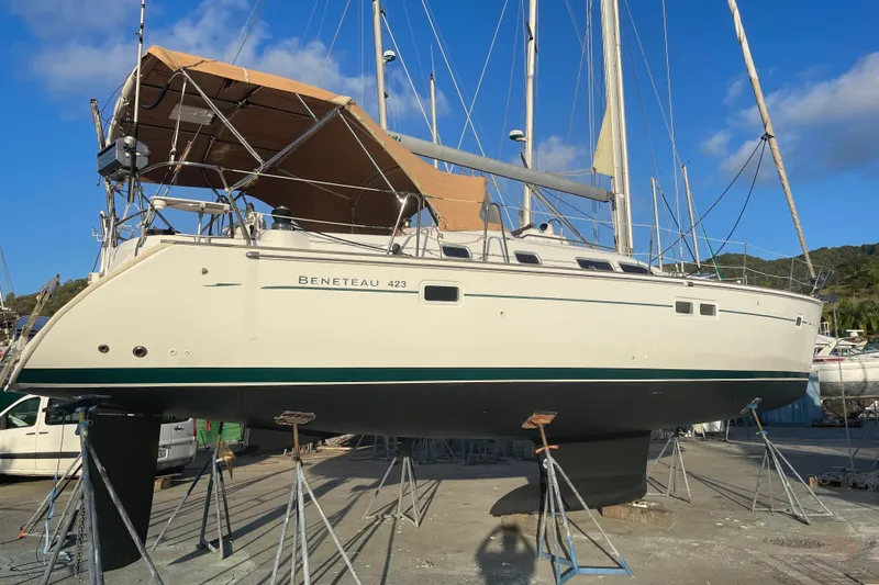 Kasoumai Yacht Photos Pics Beneteau 423 sailboat from 2007 on stands, ready for maintenance at a marina.