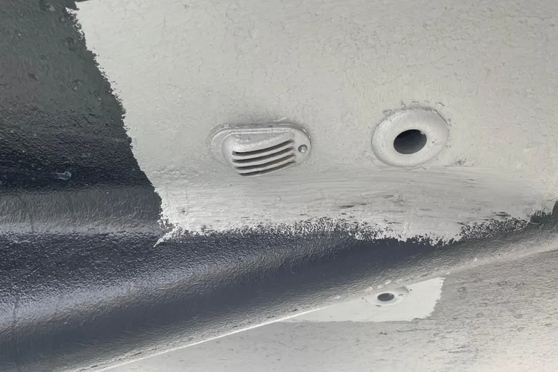 Kasoumai Yacht Photos Pics Close-up of a 2007 Beneteau 423 hull with visible fittings and paint details.