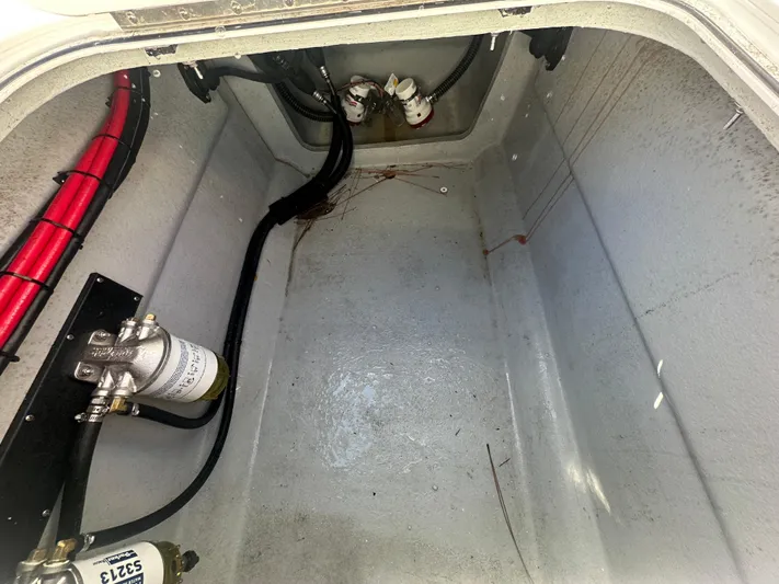  Yacht Photos Pics Bilge compartment of 2025 AmeraCat 395 boat, showing wiring and filter system.
