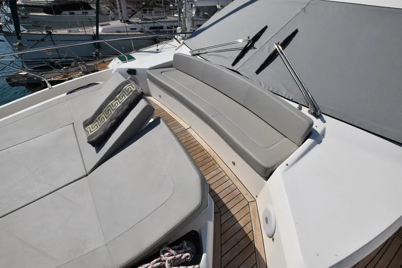 Ocean Love Yacht Photos Pics 2023 Absolute 50 Fly yacht with sleek deck seating and elegant design.