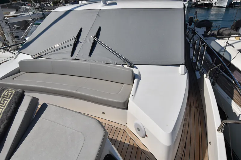 Ocean Love Yacht Photos Pics 2023 Absolute 50 Fly yacht with sleek deck and comfortable seating.