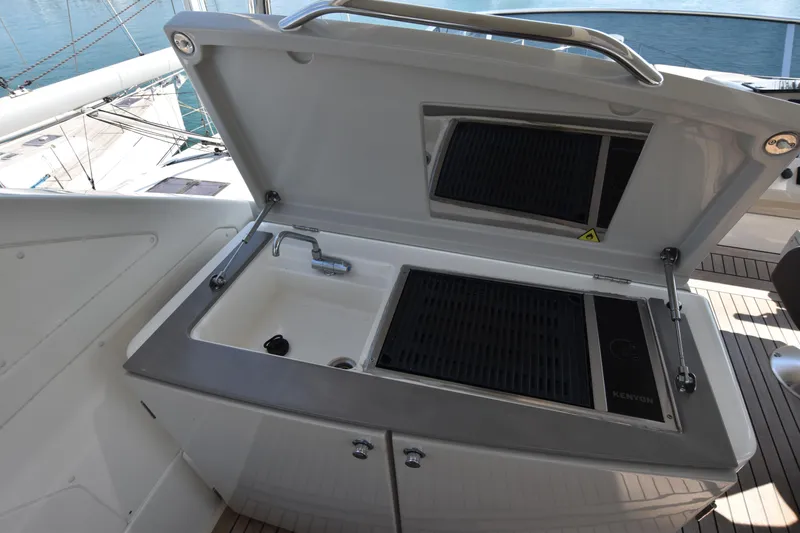 Ocean Love Yacht Photos Pics Outdoor kitchen on 2023 Absolute 50 Fly yacht with sink and grill.