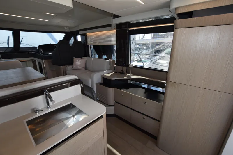 Ocean Love Yacht Photos Pics Luxurious interior of 2023 Absolute 50 Fly yacht with modern furnishings and sleek design.