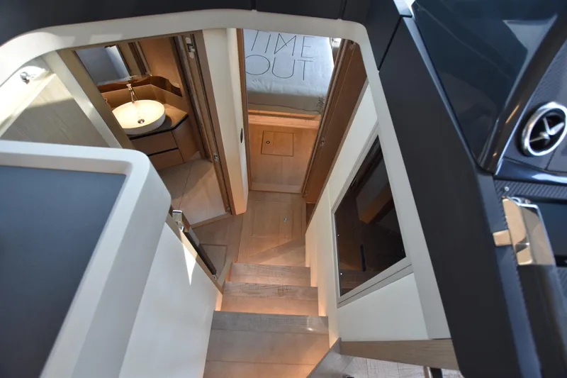 Ocean Love Yacht Photos Pics Interior view of 2023 Absolute 50 Fly yacht, featuring modern design and cozy cabin.