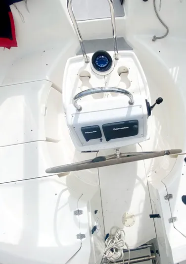 5th Row Center Yacht Photos Pics Steering console of a 1997 Hunter 430 sailboat with navigation instruments.