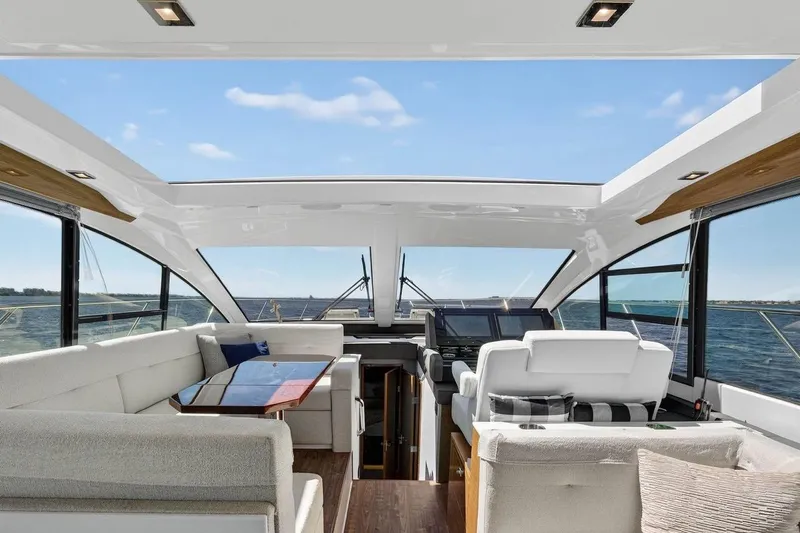  Yacht Photos Pics Luxurious interior of 2020 Cruisers Yachts 50 Cantius with ocean view.