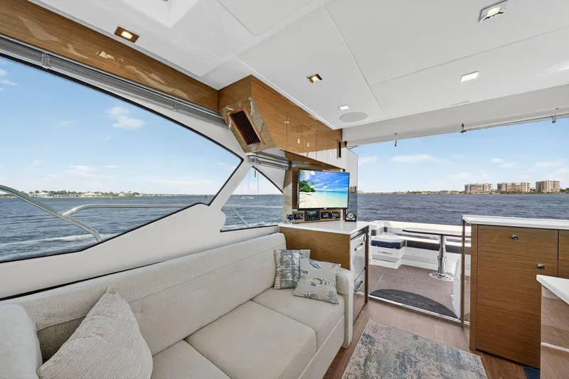  Yacht Photos Pics Luxurious interior of 2020 Cruisers Yachts 50 Cantius with scenic water view.
