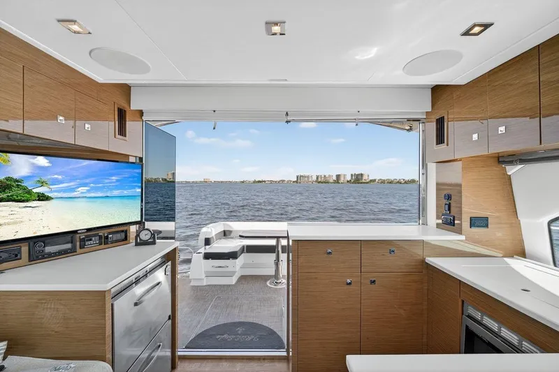 Yacht Photos Pics Interior of 2020 Cruisers Yachts 50 Cantius with open view to the water.