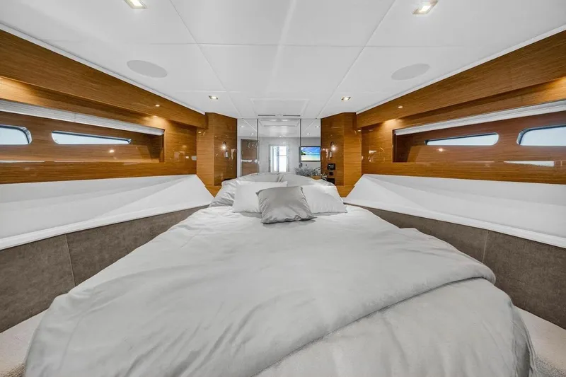  Yacht Photos Pics Luxurious bedroom interior of 2020 Cruisers Yachts 50 Cantius with modern design.