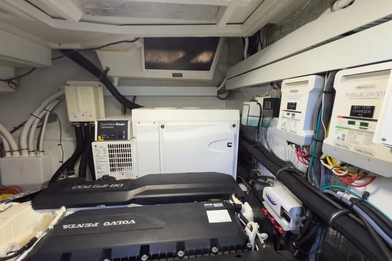  Yacht Photos Pics Engine room of 2020 Cruisers Yachts 50 Cantius with Cummins generator and Volvo Penta engine.