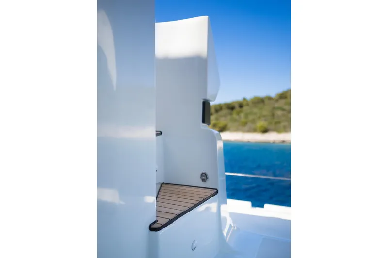Catwalk Yacht Photos Pics Lagoon 51 yacht deck detail with ocean and island view, 2023 model.