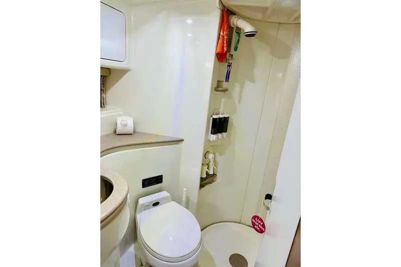  Yacht Photos Pics Bathroom of 1997 Formula 41 Performance Cruiser with toilet and shower amenities.