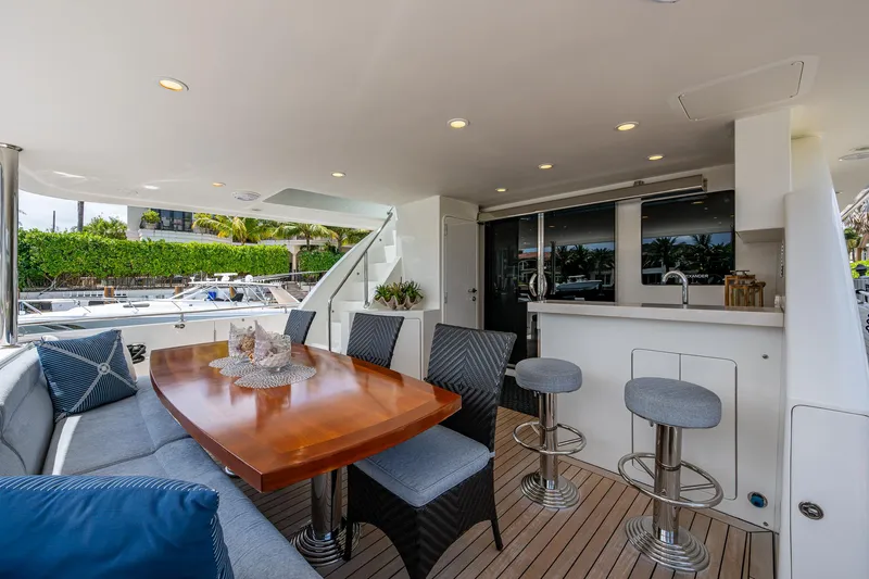 Uncorked Yacht Photos Pics Luxurious outdoor seating and bar area on 2011 Ocean Alexander 85E yacht.