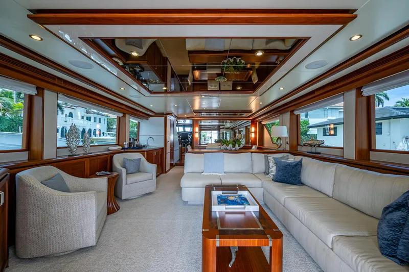 Uncorked Yacht Photos Pics Luxurious interior of 2011 Ocean Alexander 85E yacht with elegant seating and wood accents.