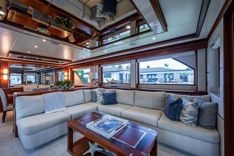 Uncorked Yacht Photos Pics Luxurious interior of 2011 Ocean Alexander 85E yacht with elegant seating and large windows.
