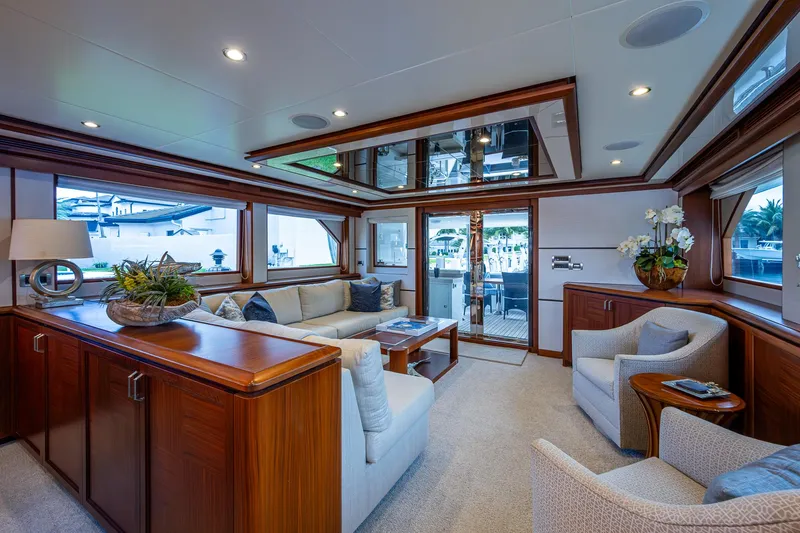 Uncorked Yacht Photos Pics Luxurious interior of 2011 Ocean Alexander 85E yacht with elegant wood finishes and plush seating.