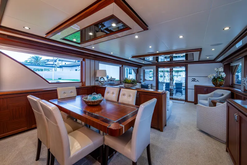 Uncorked Yacht Photos Pics Luxurious interior of 2011 Ocean Alexander 85E yacht with elegant dining area.