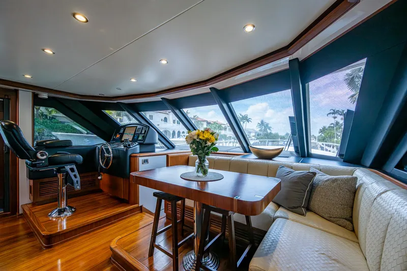 Uncorked Yacht Photos Pics Luxurious interior of 2011 Ocean Alexander 85E yacht with elegant seating and helm station.