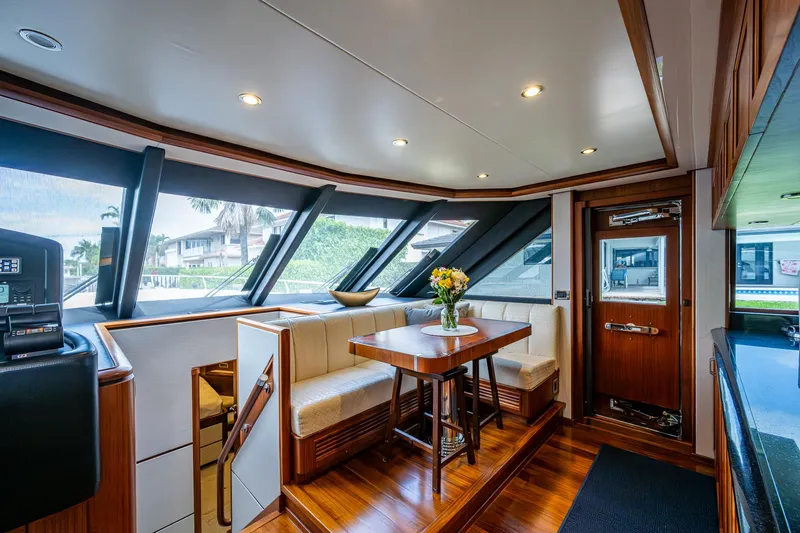 Uncorked Yacht Photos Pics Luxurious interior of 2011 Ocean Alexander 85E yacht with elegant seating and dining area.