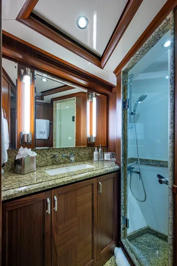 Uncorked Yacht Photos Pics Luxurious bathroom in 2011 Ocean Alexander 85E yacht with granite countertops and glass shower.