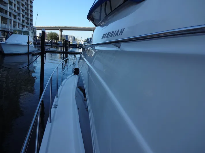 Lit Up Yacht Photos Pics Side view of 2007 Meridian 459 Motoryacht docked in marina.