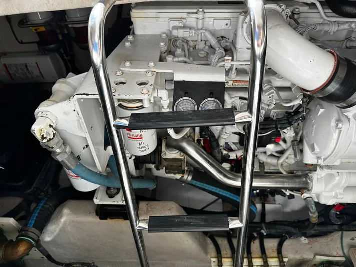 Incentive Yacht Photos Pics Engine room of 2008 Sea Ray 47 Sedan Bridge with visible machinery and ladder.