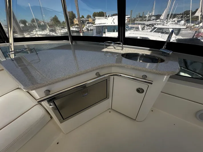 Incentive Yacht Photos Pics 2008 Sea Ray 47 Sedan Bridge yacht interior with sink and countertop.